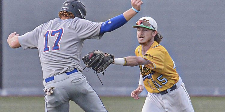 Champion City’s Brent Widder, left, is tagged out by Miners shortstop Jake Reifsnyder on a failed steal attempt during a game last season in Beckley. (F. Brian Ferguson/Lootpress)