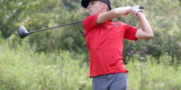 (Brad Davis/For LootPress) Oak Hill's Jack Hayes tees off during a high school golf event at Bridge Haven Golf Club Wednesday afternoon.