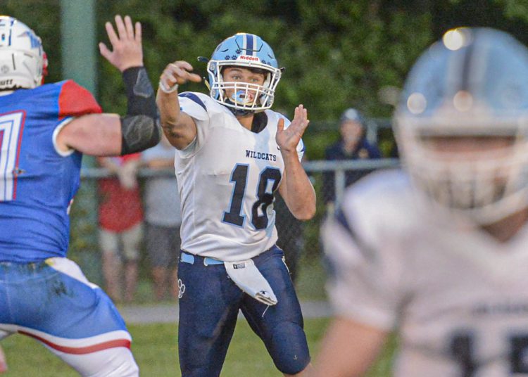 Meadow Bridge QB Dustin Adkins throws a pass against Midland Trail during a game on Sept. 10 in Hico. (F. Brian Ferguson/Lootpress).