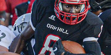 Oak Hill’s Leonard Farrow picks up yards against Westside Sept. 4 in Oak Hill. (F. Brian Ferguson/Lootpress).