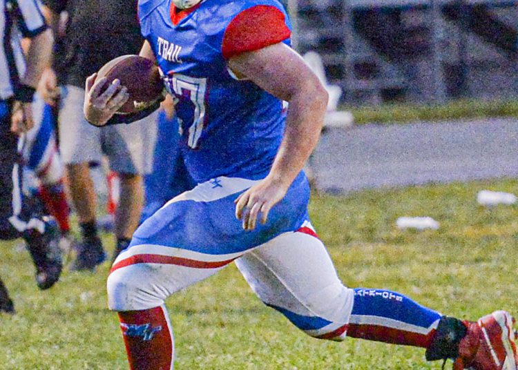 Midland Trail’s Aden Isaacs picks up yards after the catch against Meadow Bridge during Friday action in Hico. (F. Brian Ferguson/Lootpress).