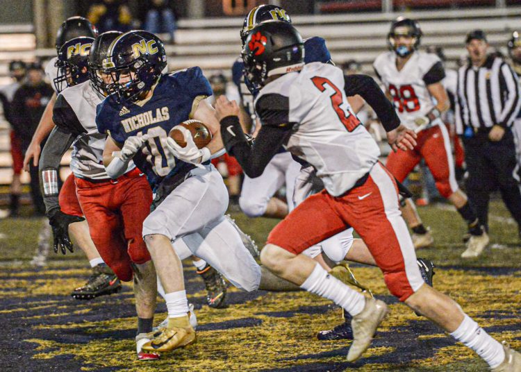 Nicholas County’s Kaleb Clark runs for a TD on the Grizzley’s first pffensive play against Pikeview on Friday in Summersville. (F. Brian Ferguson/Lootpress)