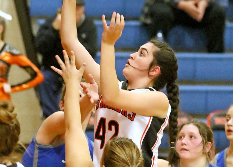 (Brad Davis/For The LootPress) Summers County's Gracie Harvey drives and scores against Montcalm on Dec. 10 at the Rogers Oil Classic in Hinton.