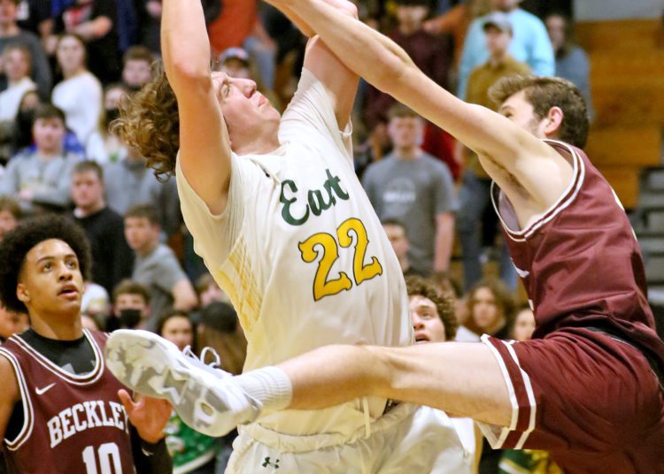 (Brad Davis/For LootPress) Greenbrier East's Kaden Huffman drives to the basket against Woodrow Wilson Friday night in Fairlea.
