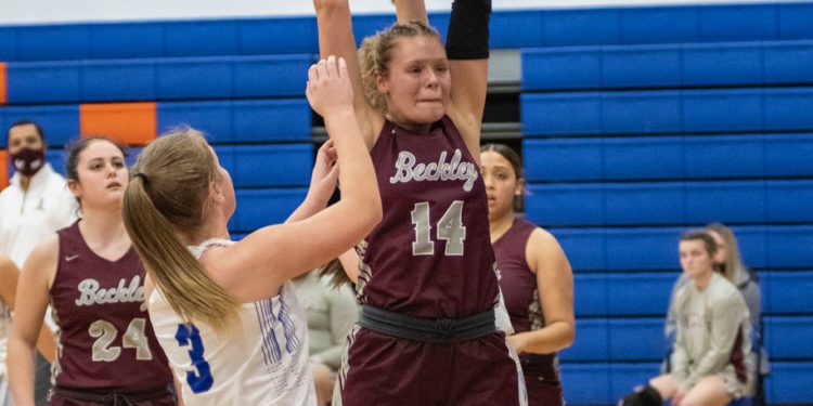 Beckley's Olivia Ziolkowski grabs a rebound in a game against Princeton on Jan. 27 (Heather Belcher/File Photo)