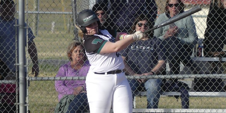 Wyoming East's Paige Laxton swings at a pitch during a game against Greenbrier East on March 21.