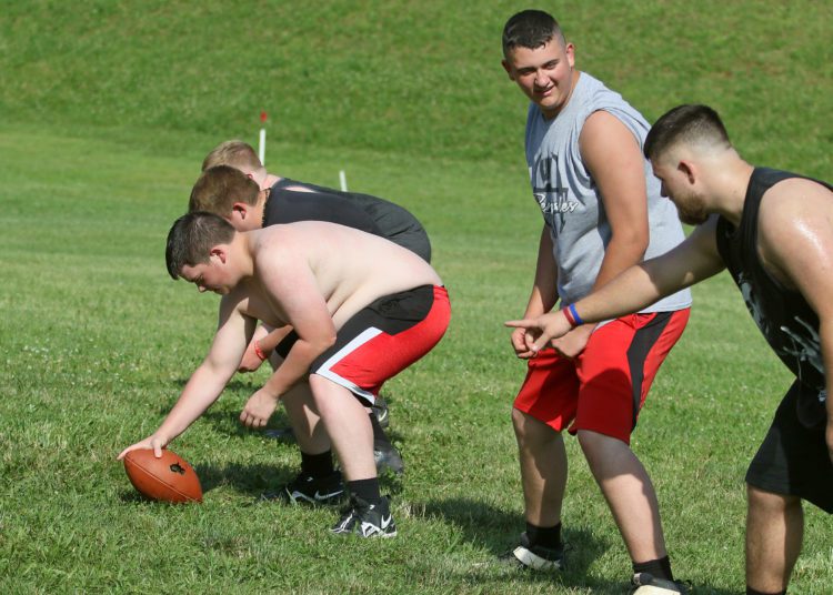 (Brad Davis/For LootPress) Westside football players work through drills during practice June 15 in Clear Fork.