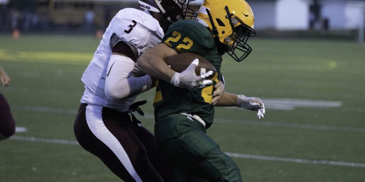 East wide receiver Jake Pate carries the ball during a game against Beckley earlier this season (File Photo by Tina Laney)