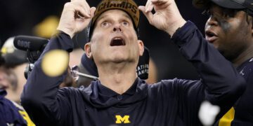 Michigan head coach Jim Harbaugh celebrates after their win against Washington in the national championship NCAA College Football Playoff game Monday, Jan. 8, 2024, in Houston. (AP Photo/Godofredo A. Vasquez)