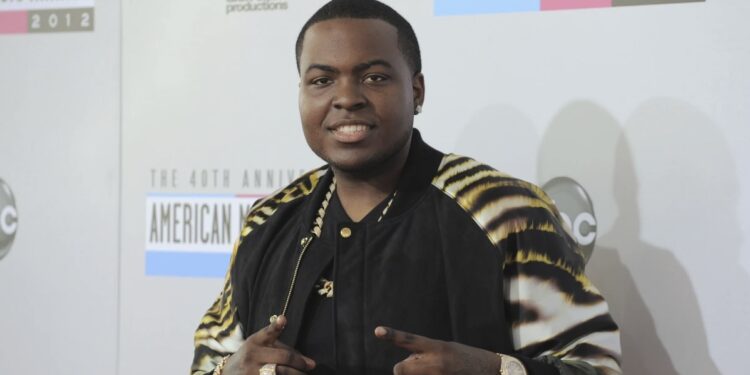 Sean Kingston arrives at the 40th Anniversary American Music Awards on Sunday Nov. 18, 2012, in Los Angeles. A SWAT team raided rapper Kingston's rented South Florida mansion on Thursday, May 23, 2024, and arrested his mother on fraud and theft charges that an attorney says stems partly from the installation of a massive TV at the home. Broward County detectives arrested Janice Turner, 61, at the home in a well-off Fort Lauderdale, Fla., suburb. (Photo by Jordan Strauss Invision/AP, File)