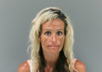 Woman arrested after striking man with truck, breaking his leg, in a domestic incident in Chapmanville, WV.