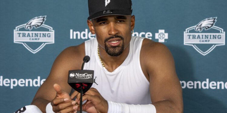 Philadelphia Eagles quarterback Jalen Hurts talks with the media following practice at NFL football training camp, Wednesday, July 24, 2024, in Philadelphia. (AP Photo/Chris Szagola)