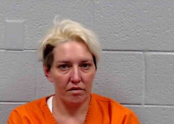 An ex-girlfriend faces charges after activating and using a debit card in her ex-boyfriend's name.