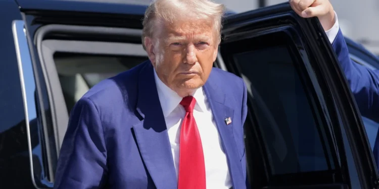 Republican presidential nominee former President Donald Trump arrives at Harry Reid International Airport to board a plane after a campaign trip, Saturday, Sept.14, 2024, in Las Vegas. (AP Photo/Alex Brandon)