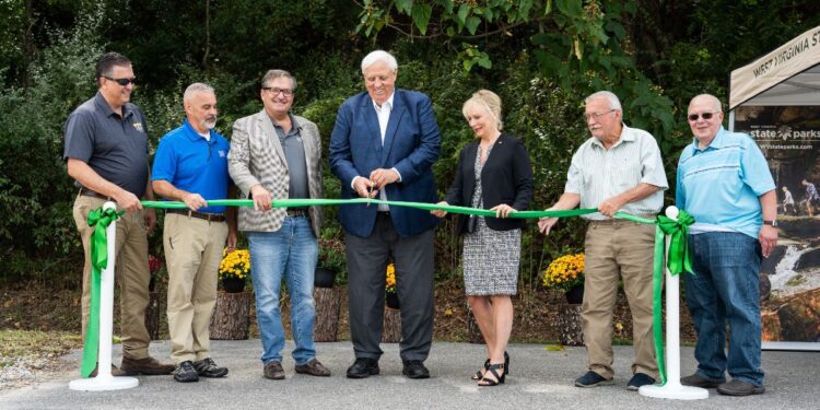 Gov. Justice cuts ribbon on Chief Logan State Park Connector Trail, linking lodge to Hatfield-McCoy Trails system