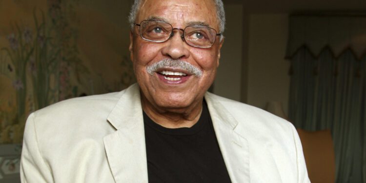 FILE - Actor James Earl Jones poses for photos in Sydney, Australia, Jan. 7, 2013. Jones, who overcame racial prejudice and a severe stutter to become a celebrated icon of stage and screen has died at age 93, Monday, Sept. 9, 2024. (AP Photo/Rick Rycroft, File)