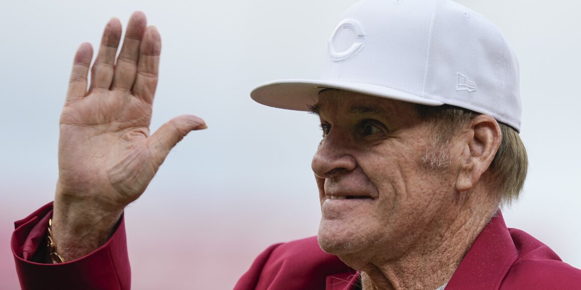 FILE - Former Cincinnati Reds player Pete Rose waves to fans after being introduced during the Reds Hall of Fame Induction Ceremony, July 15, 2023, in Cincinnati. (AP Photo/Darron Cummings, File)