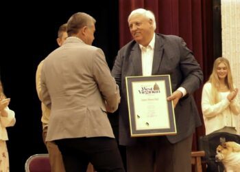 Governor Justice presents Shawn Ball with the "Distinguished West Virginian" award