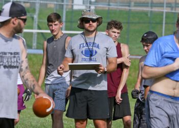 (Brad Davis/For LootPress) Westside head coach Justin Cogar watches his players as they work through drills during practice June 15 in Clear Fork.