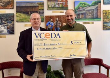 A ceremonial check representing a $100,000 VCEDA grant for Breaks Park Improvements was presented to Breaks Park Superintendent Austin Bradley, right, by VCEDA Executive Director/General Counsel Jonathan Belcher, left. Photo: VCEDA