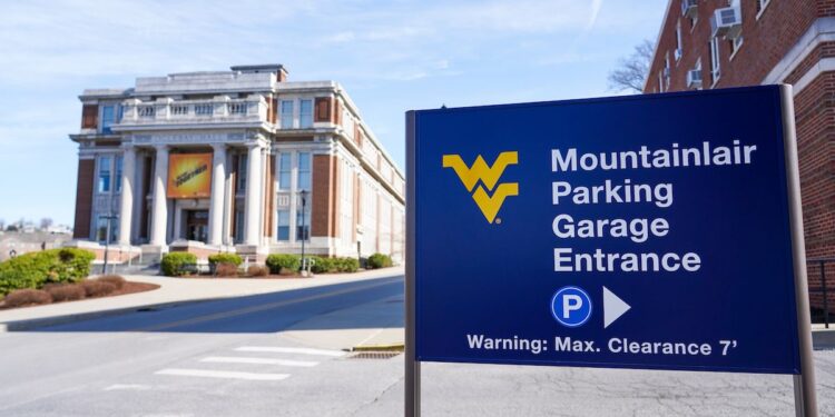 A collection of various parking lots are photographed on campus, March 29, 2022. Photo: Morgan Goff.