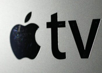 FILE - The logo for an Apple TV converter is seen on Oct. 6, 2010, in New York. (AP Photo/Mark Lennihan, File)