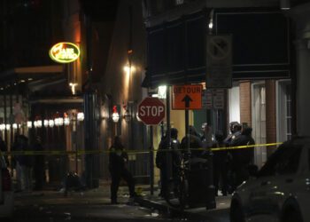 Emergency services attend the scene after a vehicle drove into a crowd on New Orleans' Canal and Bourbon Street, Wednesday Jan. 1, 2025. (AP Photo/Gerald Herbert)