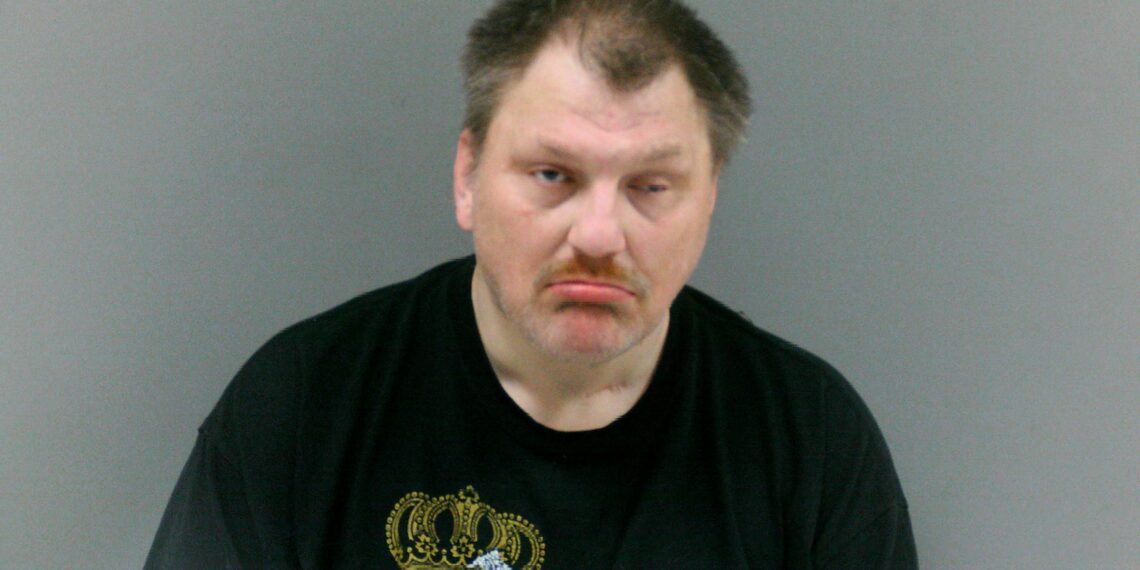 Man sprays fluid and butane inside house, threatens to burn it