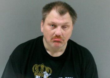 Man sprays fluid and butane inside house, threatens to burn it