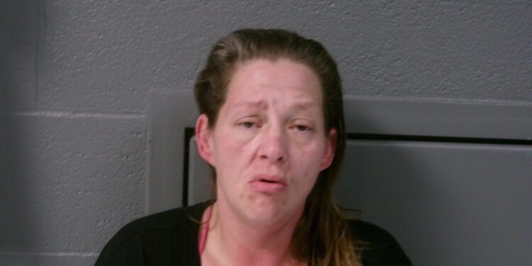 Mother strikes son in the back of the head with a vacuum cleaner