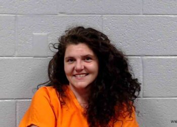 Woman stole flowers at Walmart while closed and driving impaired with child in vehicle