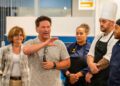 Prior to lunch service at the Mountainlair, Travis Young (center), senior president of education for Elior North America, provides an update to employees with WVU Hospitality Group, the new dining partnership between the University and Elior Collegiate Dining. (WVU Photo/Savanna Leech)